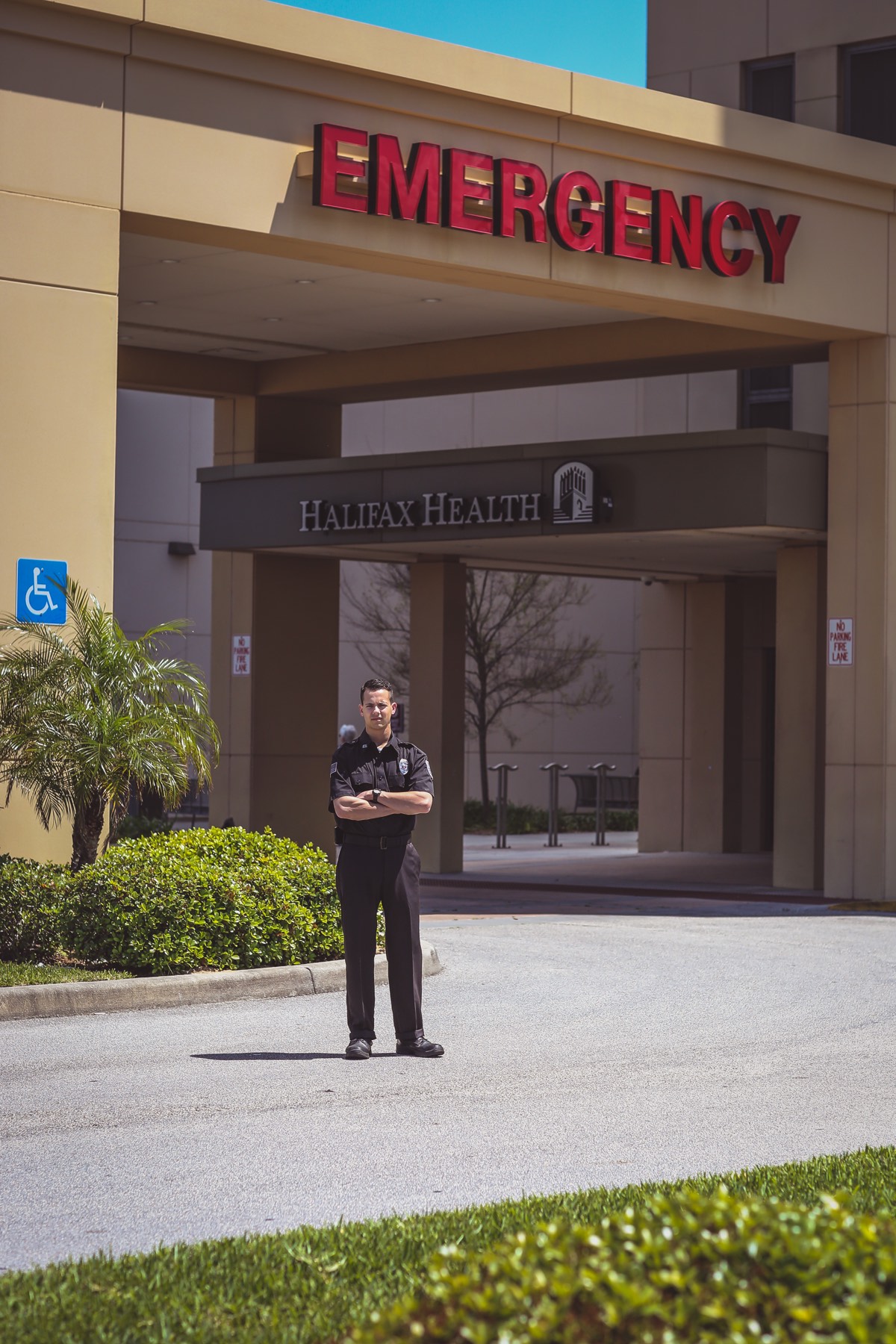Vital Security officer stationed outside a Halifax Health emergency entrance